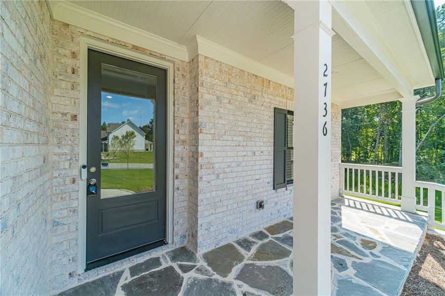 Exterior details and patio area of a home in , Loganville (Image 29).