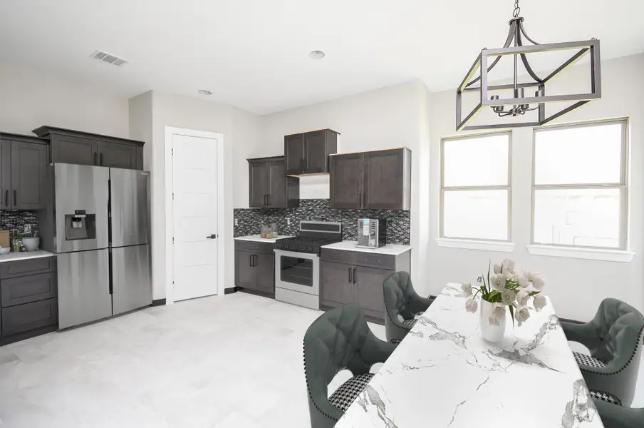 Kitchen and Breakfast area is huge! Lots of Cabinets and Counterspace. Virtually Staged Image of Appliances. Built-in Appliances will be installed before closing. Kitchen and Breakfast area is huge! Lots of Cabinets and Counterspace. Virtually Staged Image of Appliances. Built-in Appliances will be installed before closing.