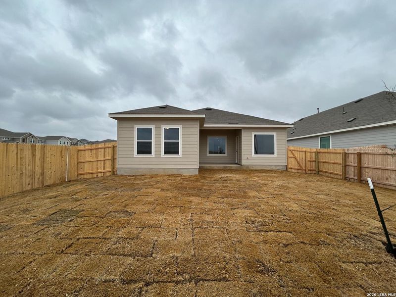 Exterior details and patio area of a home in Hennersby Hollow, San Antonio (Image 3).
