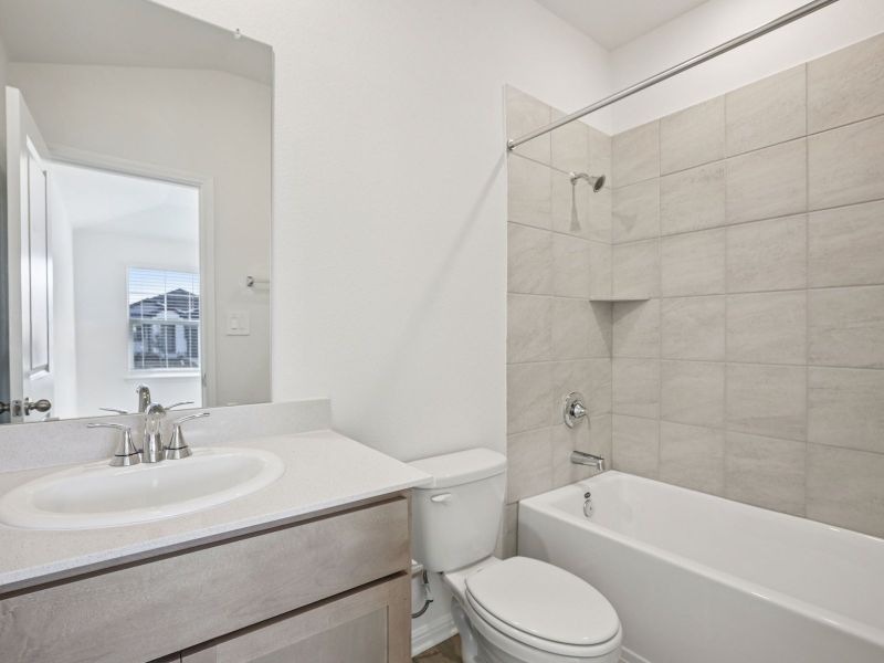 Furnished interior view inside a new home in Prairie Winds - Reserve Collection, Hutto (Image 8).