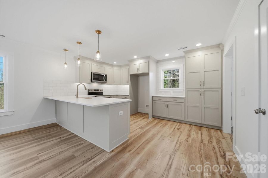 Furnished interior view inside a new home in , Statesville (Image 14).