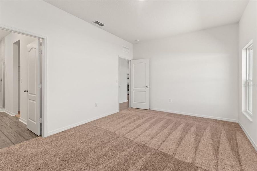 Spacious, unfurnished interior of a new home in Peach Crossings, Winter Haven (Image 17). Spacious, unfurnished interior of a new home in Peach Crossings, Winter Haven (Image 17).