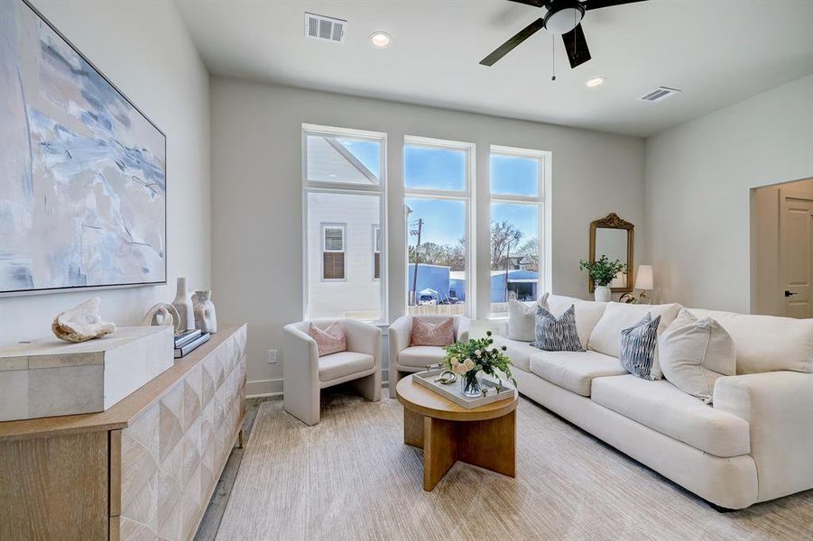 From this view of the living room, youcan see the powder bathroom doorto the right.