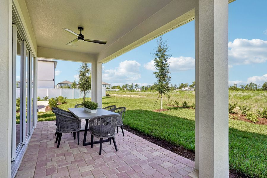 Exterior details and patio area of a home in Northlake at Ovation, Winter Garden (Image 23).