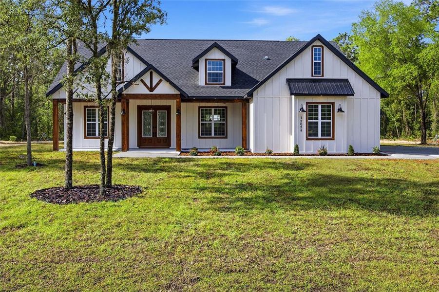 Front exterior of a new home in , Dunnellon, FL, highlighting curb appeal (Image 26). Front exterior of a new home in , Dunnellon, FL, highlighting curb appeal (Image 26).
