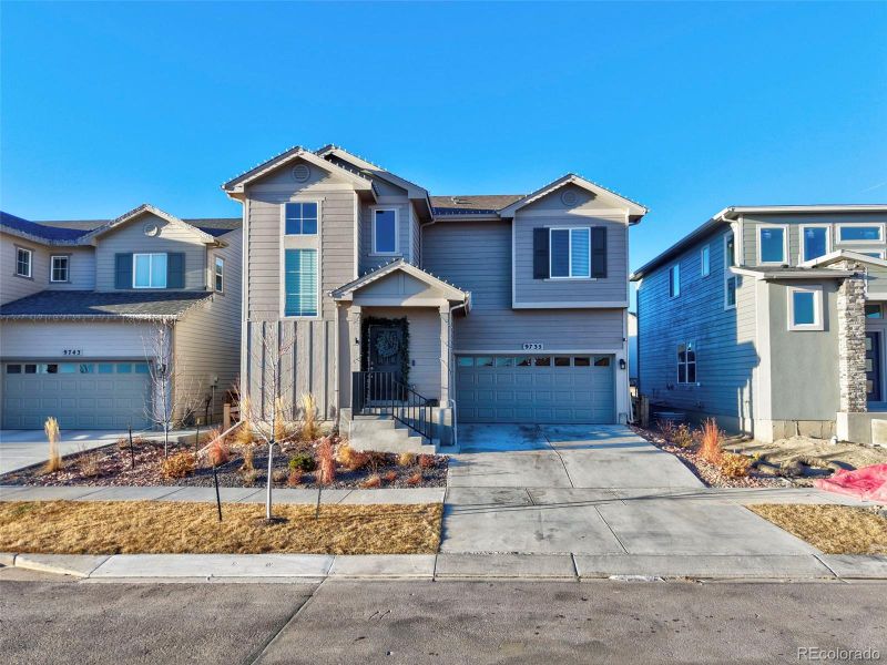 Front exterior of a new home in , Colorado Springs, CO, highlighting curb appeal (Image 20).