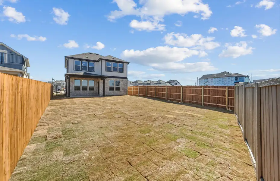 Exterior details and patio area of a home in Santa Rita Ranch, Liberty Hill (Image 3).