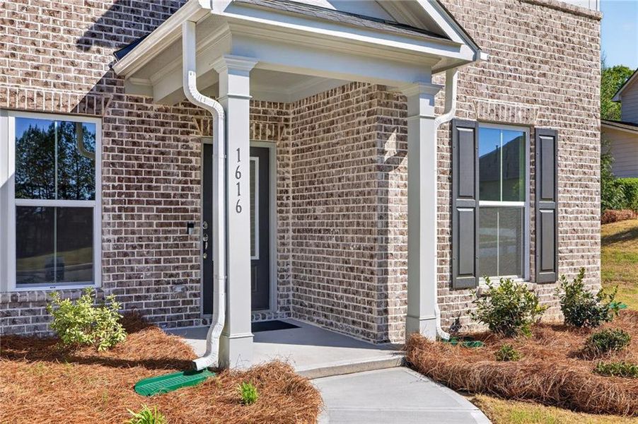 Exterior details and patio area of a home in Riversprings, Dacula (Image 4).