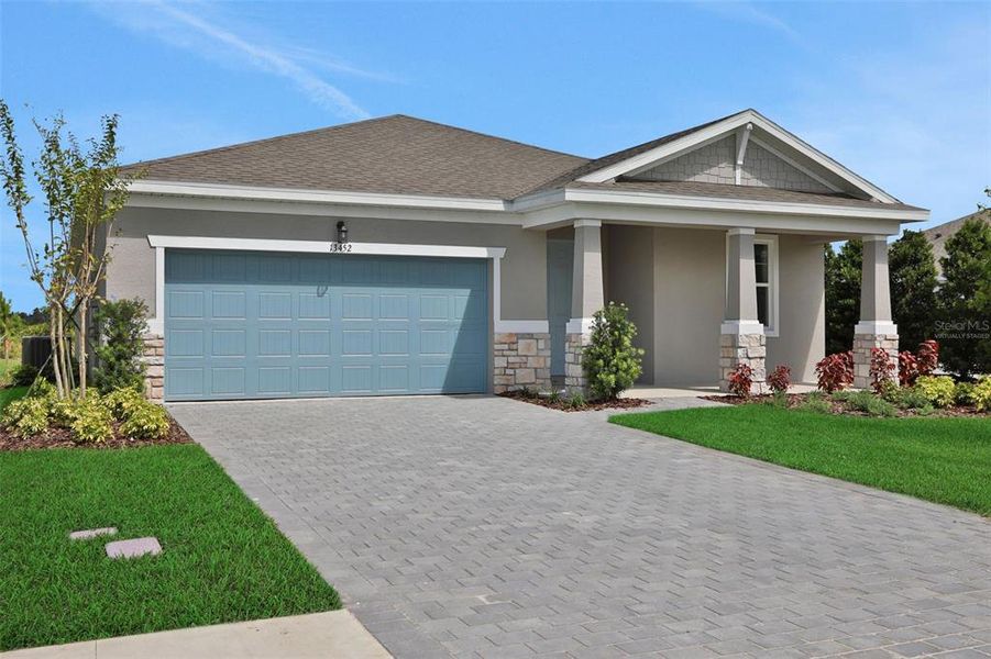 Front exterior of a new home in Tuscan Hills, Dade City, FL, highlighting curb appeal (Image 2). Front exterior of a new home in Tuscan Hills, Dade City, FL, highlighting curb appeal (Image 2).