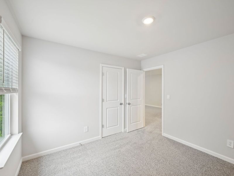 Spacious, unfurnished interior of a new home in Martin Springs - Estate Series, Lawrenceville (Image 21).