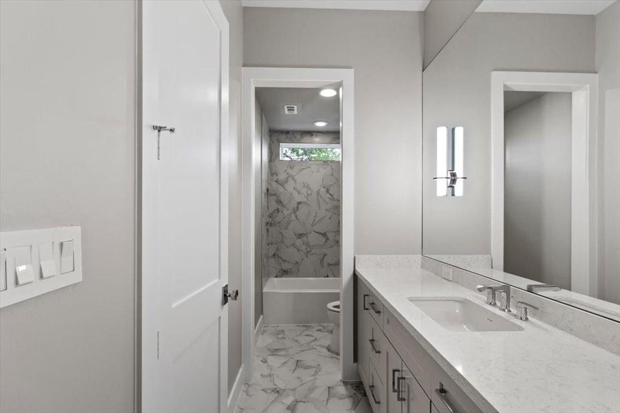 This is the 2nd floor active bath that has access from the hallway as well as a bedroom
