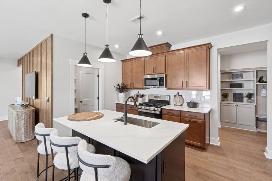 Representative furnished interior of a home built from the Hickory Hill by Tri Pointe Homes in The Grove Collection at Serenity, Fuquay Varina (Image 8). Representative furnished interior of a home built from the Hickory Hill by Tri Pointe Homes in The Grove Collection at Serenity, Fuquay Varina (Image 8).