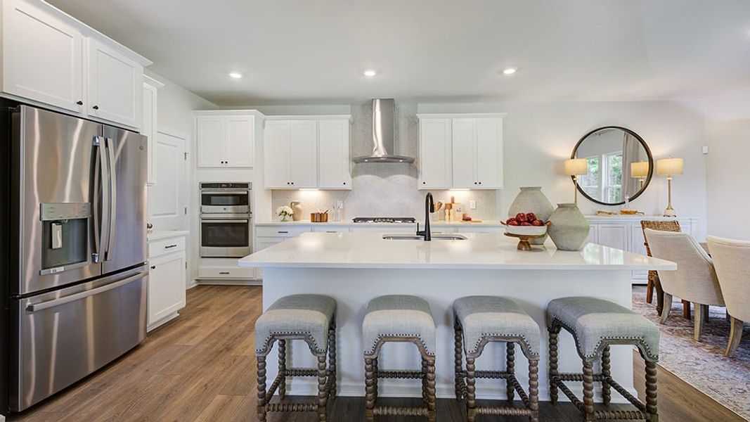 Representative furnished interior of a home built from the Quincy by Taylor Morrison in Camden, Willow Spring (Image 13).