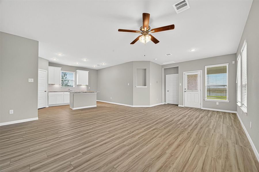 Spacious, unfurnished interior of a new home in Sunterra, Katy (Image 39).