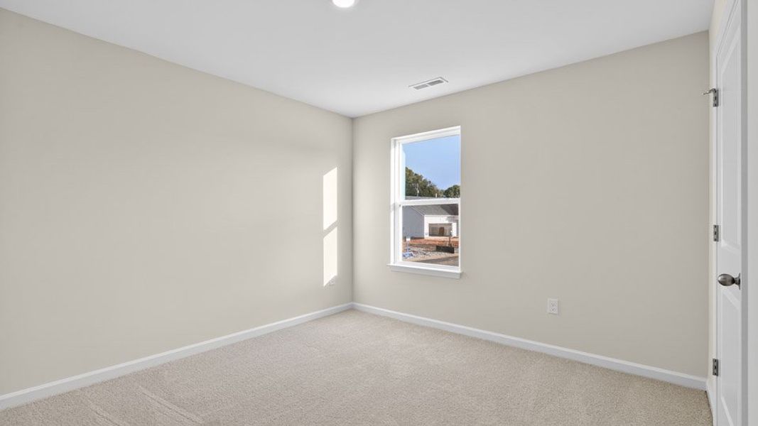 Spacious, unfurnished interior of a new home in Honeycutt Oaks, Angier (Image 26).