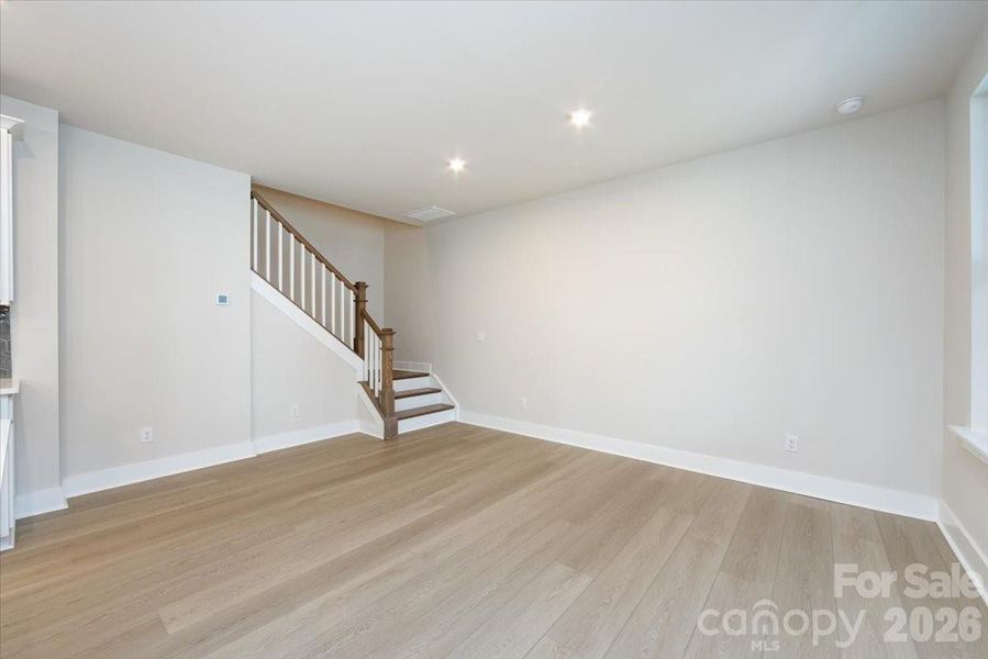 Dining Space with Oak Box Stairs with Open Rails
