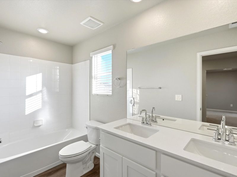 Furnished interior view inside a new home in Paint Brush Hills, Peyton (Image 6).