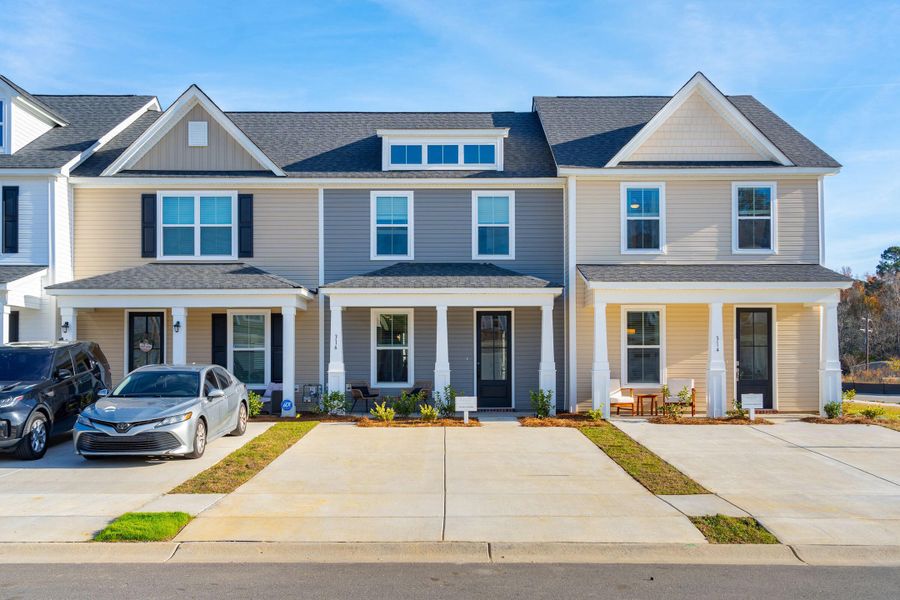 Front exterior of a new home in Abbey Walk, Moncks Corner, SC, highlighting curb appeal (Image 28). Front exterior of a new home in Abbey Walk, Moncks Corner, SC, highlighting curb appeal (Image 28).