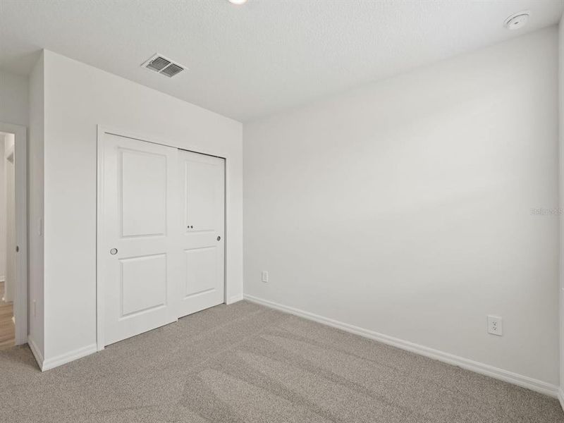 Spacious, unfurnished interior of a new home in The Reserve at Van Oaks, Auburndale (Image 15).