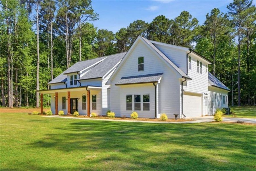 Front exterior of a new home in , Oxford, GA, highlighting curb appeal (Image 2). Front exterior of a new home in , Oxford, GA, highlighting curb appeal (Image 2).