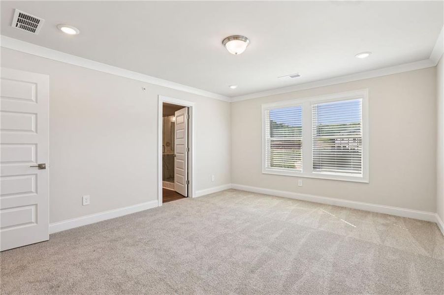 Spacious, unfurnished interior of a new home in Hemingway - Highland Series, Cumming (Image 37).