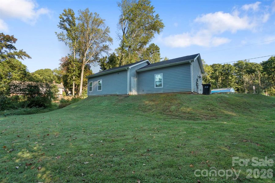 Exterior details and patio area of a home in , Charlotte (Image 24).