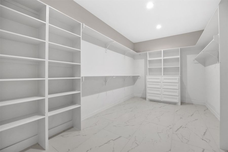 13x19 primary closet with custom drawers & shelving 13x19 primary closet with custom drawers & shelving