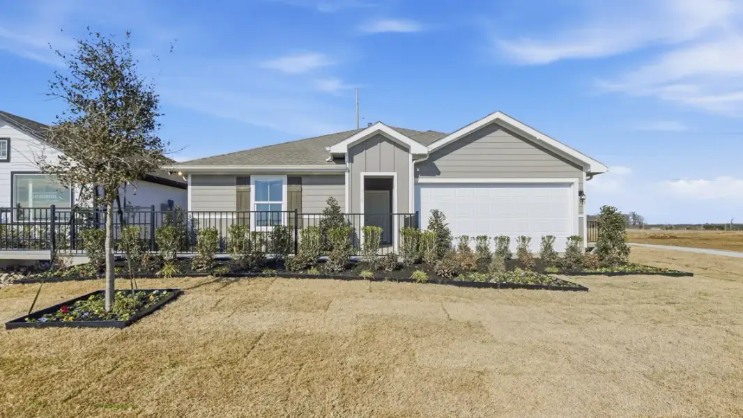 Representative exterior photo of a completed home built from the Bellvue by D.R. Horton in Hadley Farms, Godley, TX (Image 23).