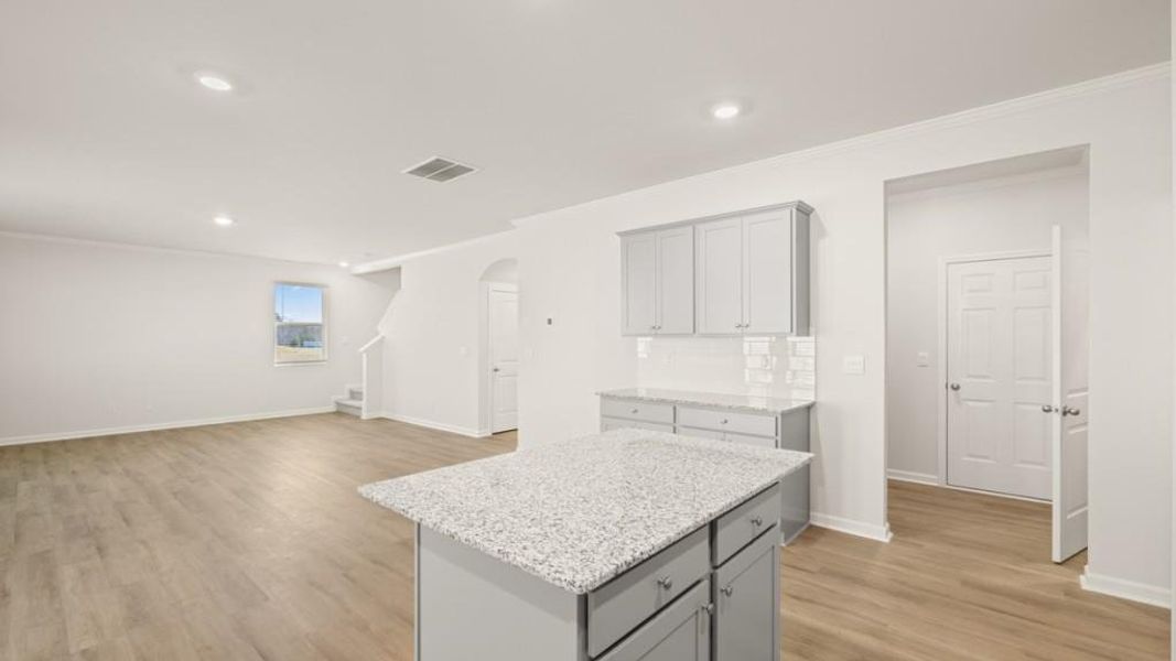 Furnished interior view inside a new home in Northwoods at Mirror Lake, Villa Rica (Image 4).