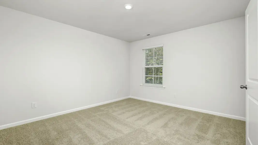 Spacious, unfurnished interior of a new home in Neal Place, Stokesdale (Image 23).