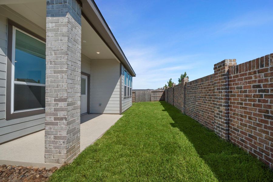Exterior details and patio area of a home in Emory Glen, Magnolia (Image 25).
