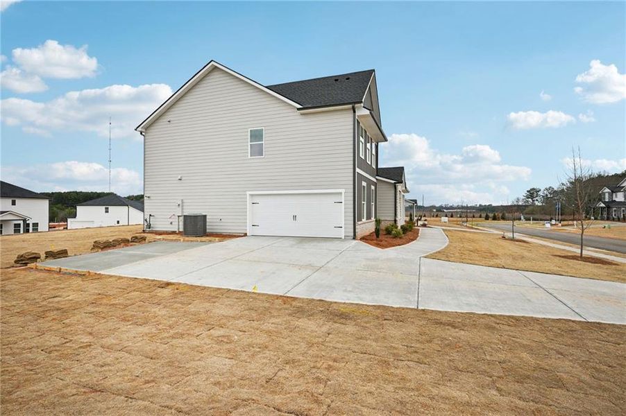 Exterior details and patio area of a home in River Pointe, Monroe (Image 26).