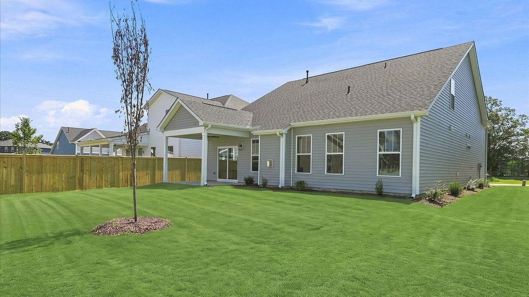 Highly functional rear covered porch adds memorable living space to this elegant home Highly functional rear covered porch adds memorable living space to this elegant home