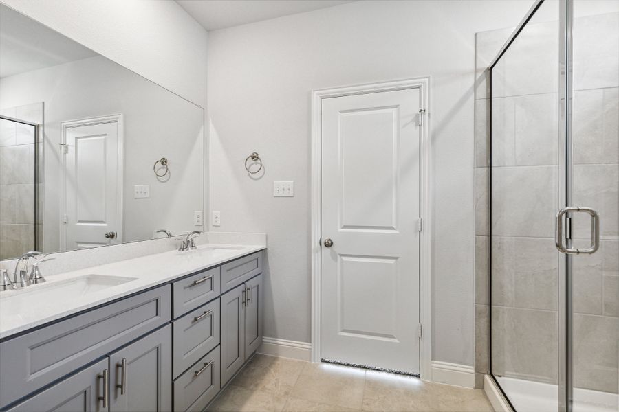 Representative furnished interior of a home built from the Lyla by Megatel Homes in Santorini, Seagoville (Image 6).