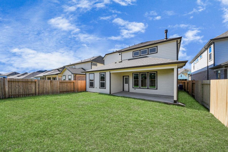 Backyard retreat, offering an abundance of space for kids to play and explore. The possibilities are endless in this outdoor haven, where the joy of open-air activities and family gatherings awaits.