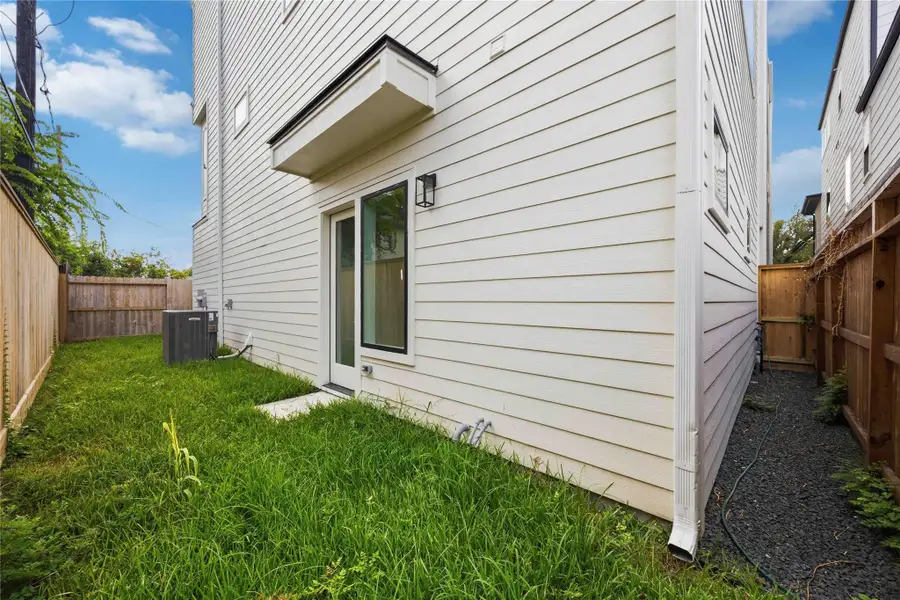 Exterior details and patio area of a home in , Houston (Image 19). Exterior details and patio area of a home in , Houston (Image 19).