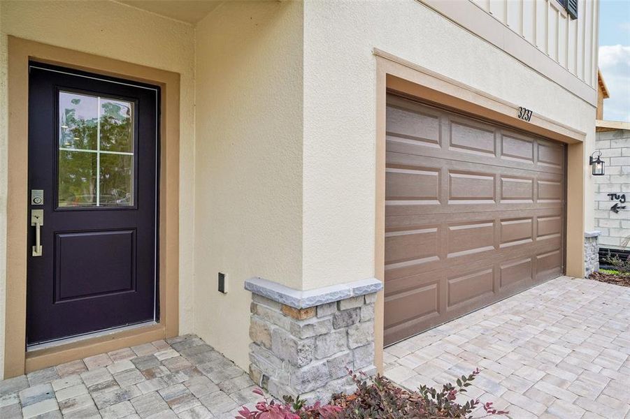 Exterior details and patio area of a home in Grasslands West, Lakeland (Image 21).