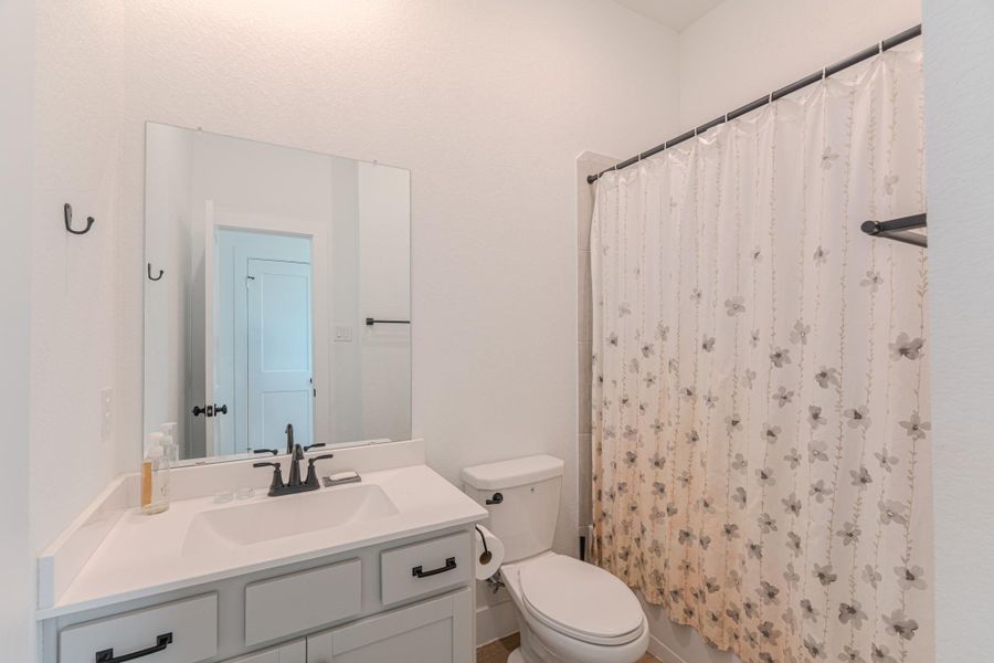 Furnished interior view inside a new home in The Woodlands Hills, Willis (Image 15).