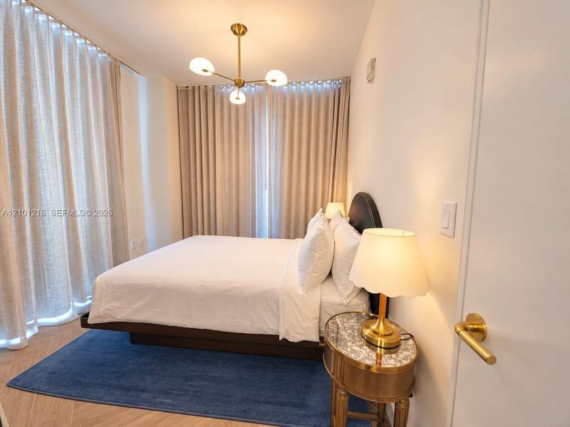 Furnished interior view inside a new home in NoMad Residences, Miami (Image 12).