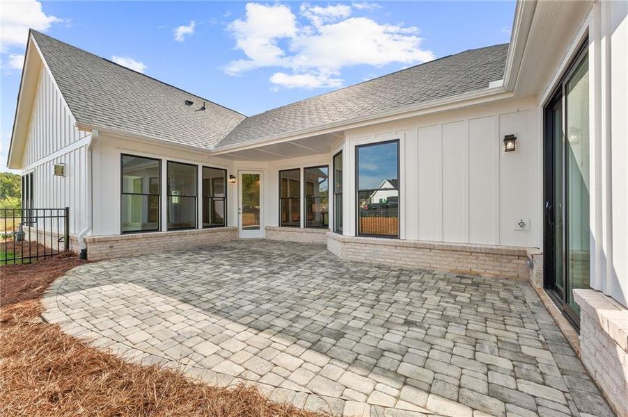 Exterior details and patio area of a home in The Courtyards by The Manor, Alpharetta (Image 30). Exterior details and patio area of a home in The Courtyards by The Manor, Alpharetta (Image 30).