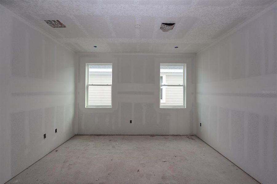 In-progress construction of a new home in Center Lake on the Park, St. Cloud, FL (Image 7).