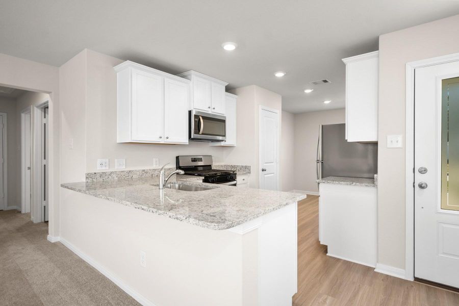 Furnished interior view inside a new home in Pinewood Trails, Cleveland (Image 5).