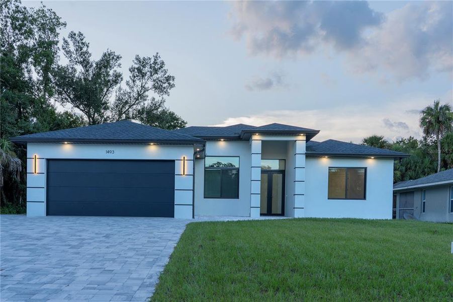 Front exterior of a new home in , North Port, FL, highlighting curb appeal (Image 32).
