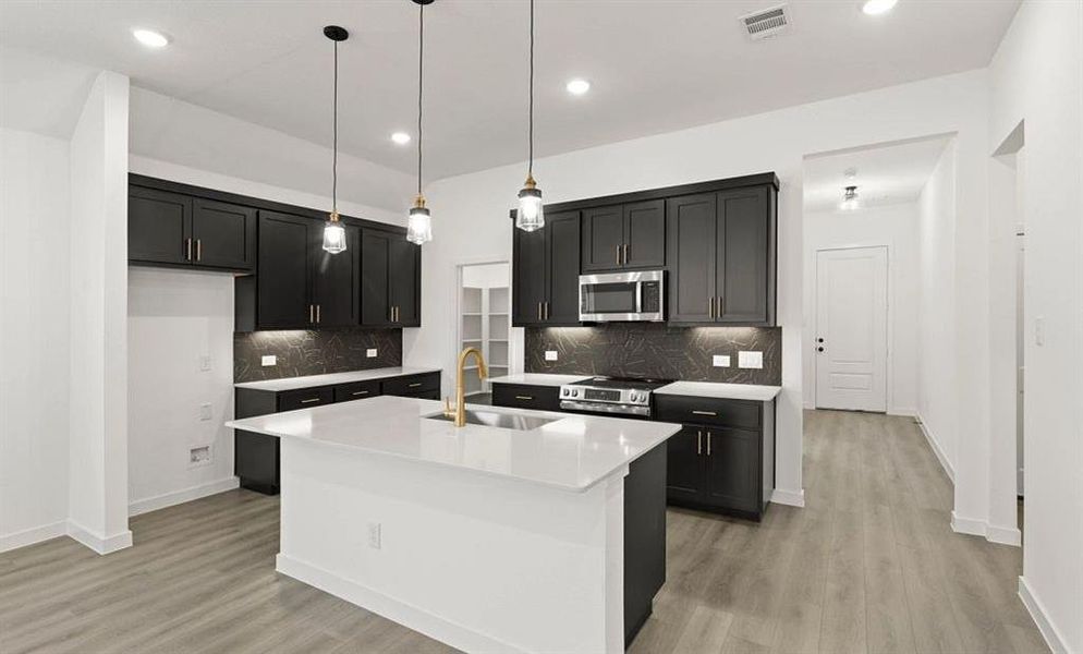 Kitchen featuring the Noir Collection
