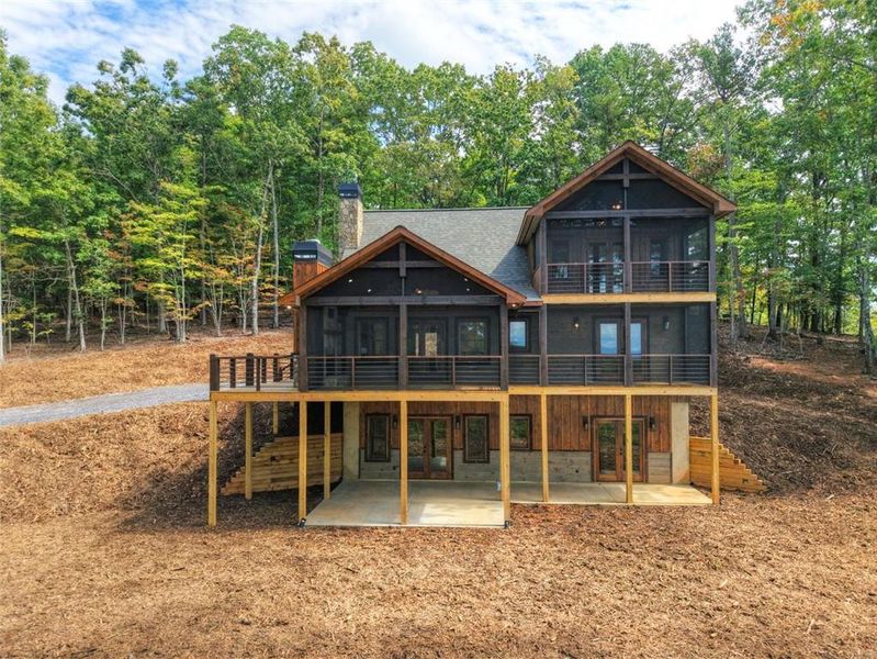 Front exterior of a new home in , Morganton, GA, highlighting curb appeal (Image 28).