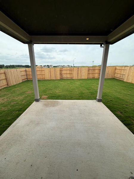 Rear Covered Patio & Private Backyard of Home Rear Covered Patio & Private Backyard of Home