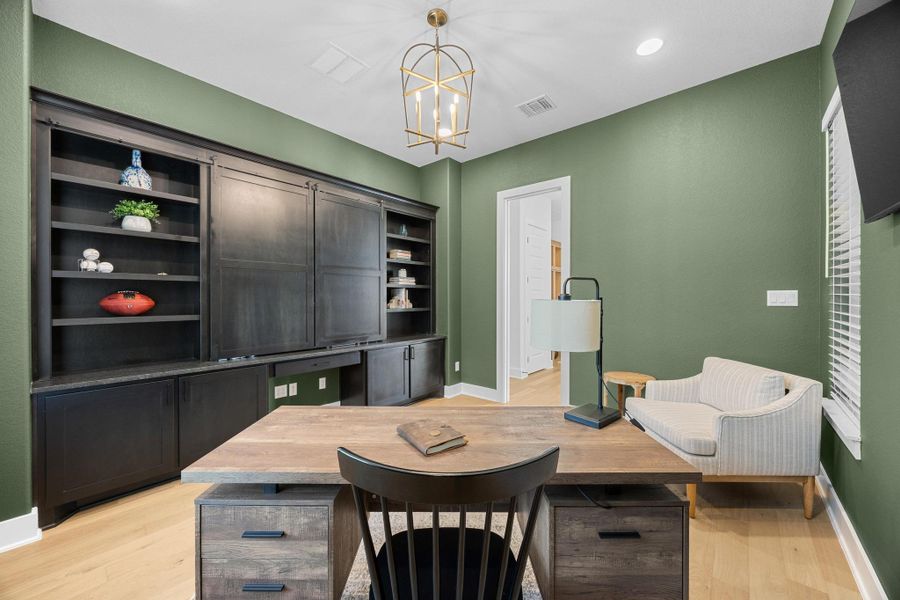 Office area featuring light wood-style floors, a chandelier, and recessed lighting