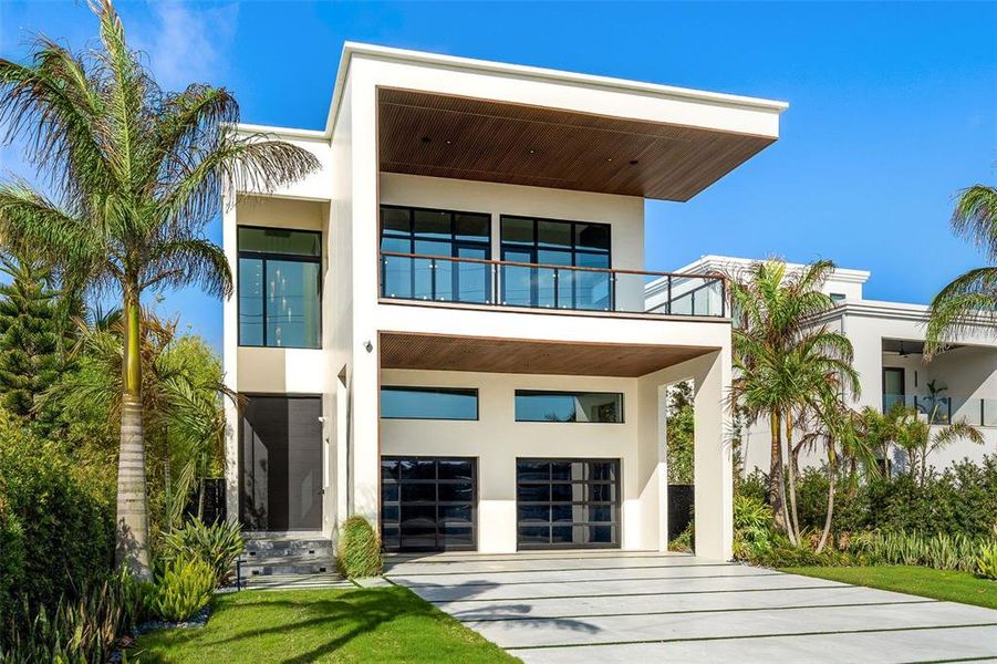 Front exterior of a new home in , New Smyrna Beach, FL, highlighting curb appeal (Image 29).
