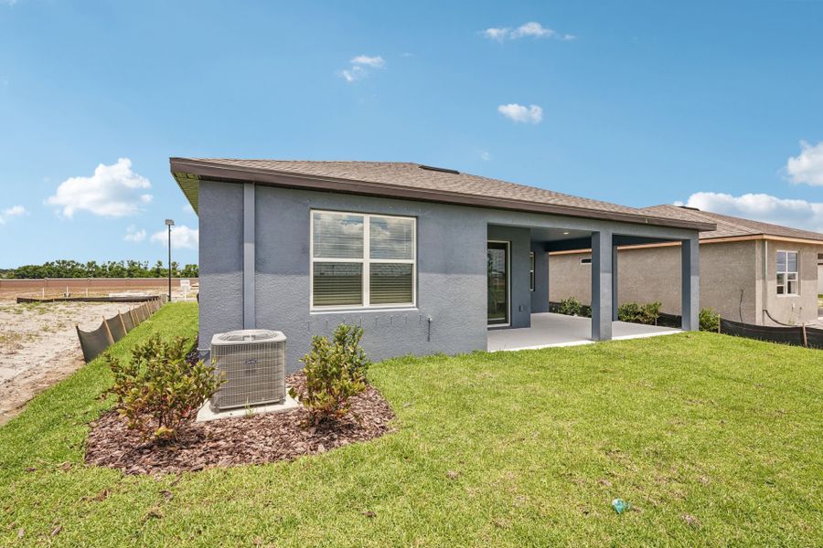 Exterior details and patio area of a home in Seaire, Parrish (Image 3).