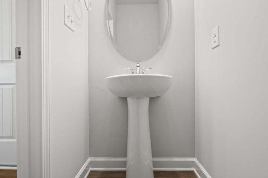 Representative furnished interior of a home built from the Camellia by Caviness & Cates Communities in Bartlett Manor, Youngsville (Image 27).